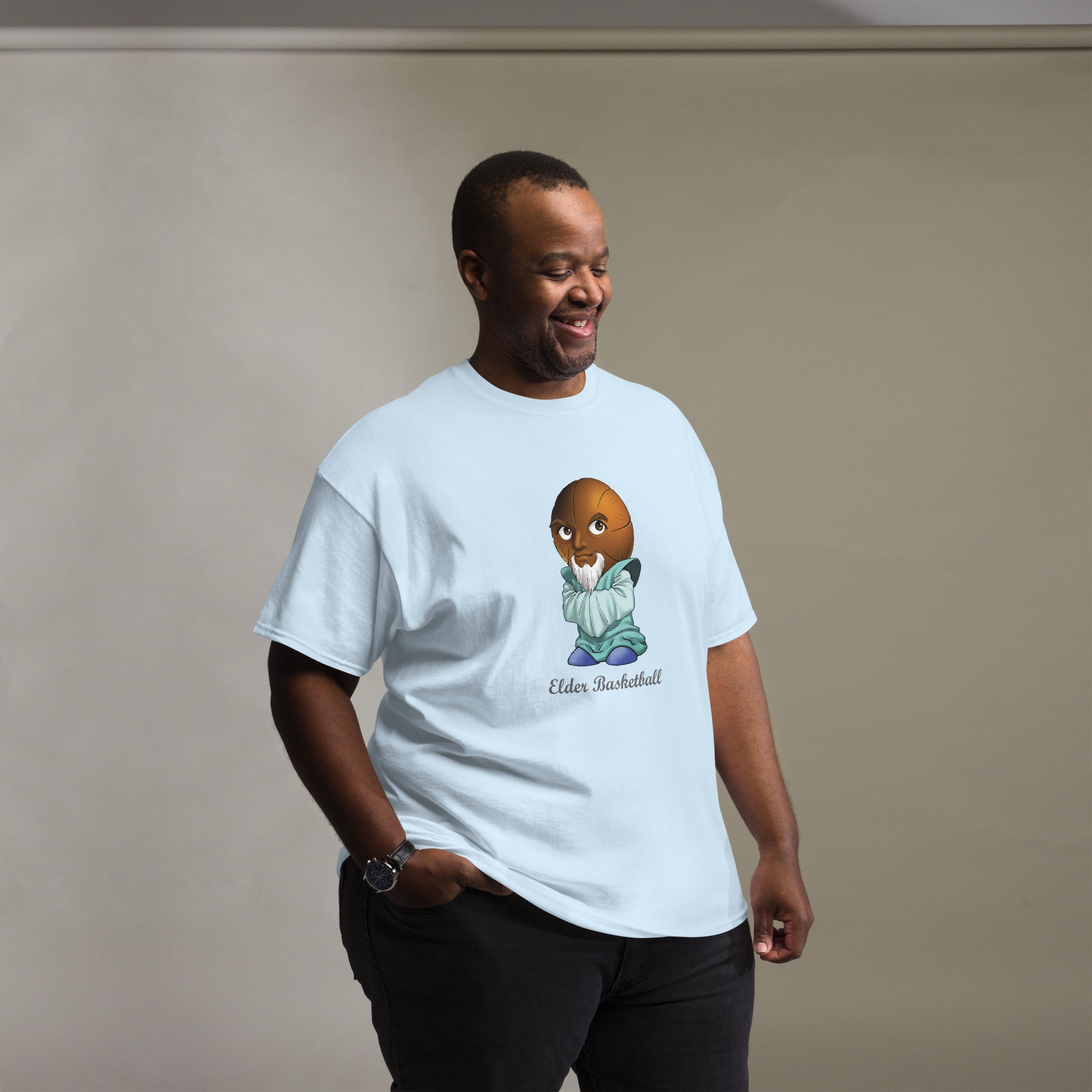Man wearing a white t-shirt with a Elder Basketball Print Men’s Classic Tee – Cotton Athletic Streetwear T-Shirt 