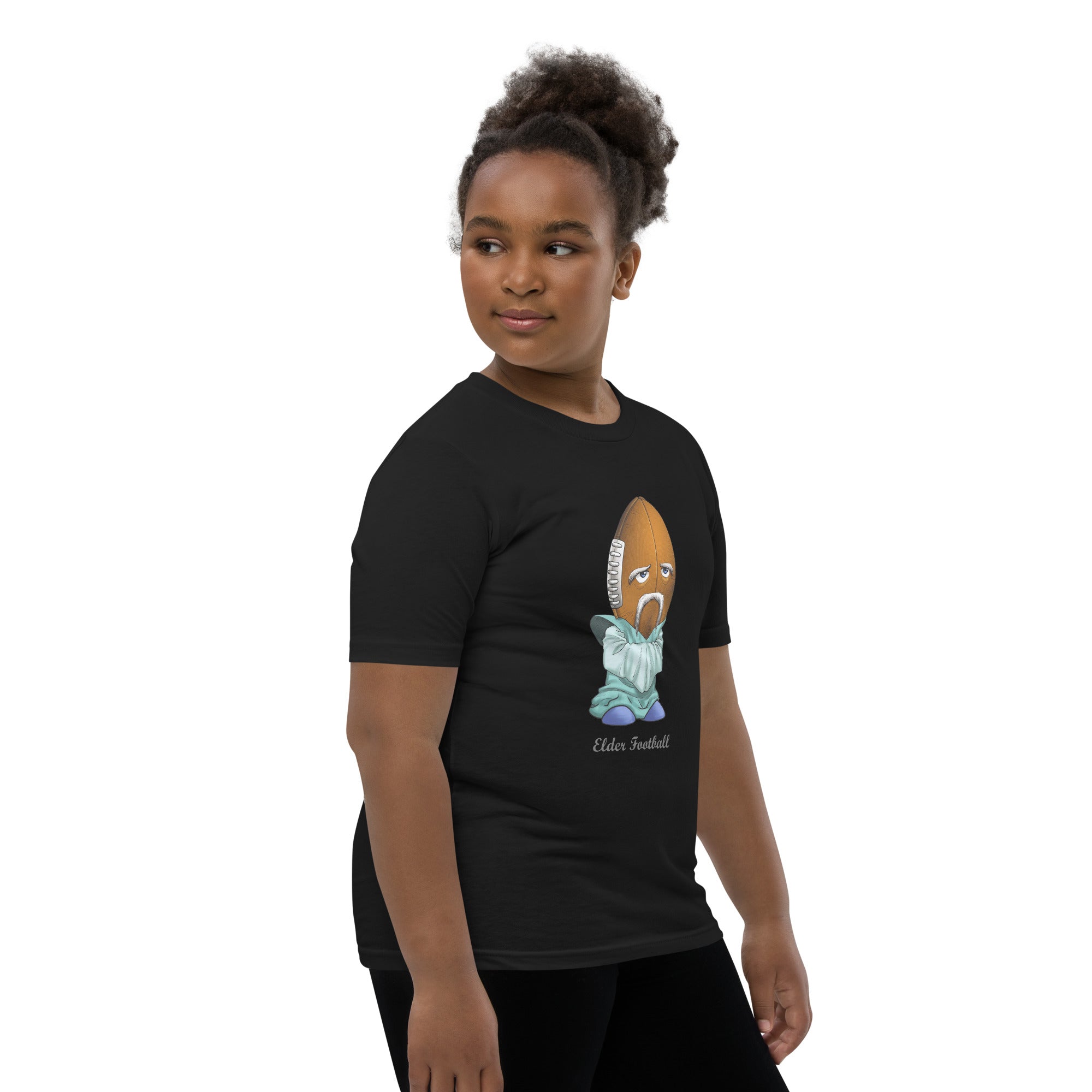 Teen wearing a black t-shirt with a graphic design on a white background