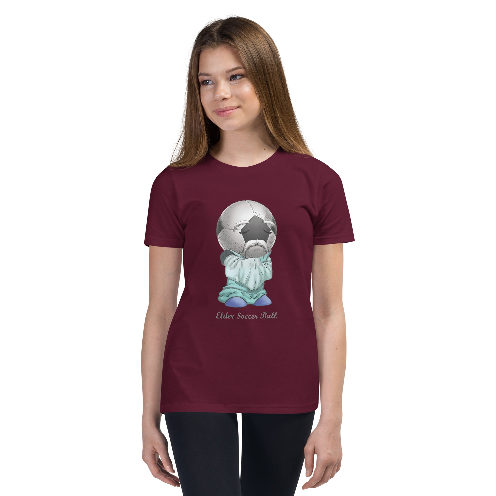 Teen wearing a maroon t-shirt with a Elder Soccer Ball graphic design 